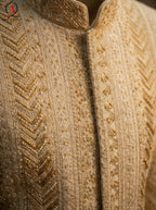 Cream Sherwani with Straight Lining Thread Embroidery & Handcrafted Golden-Cream Bead Work